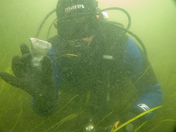 Jonathan Benjamin excavating at Helnaes Bay